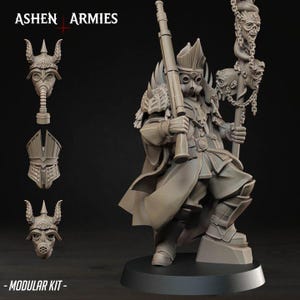 Op de afbeelding: Grijze modulaire kitfiguur van een krijger met een gasmasker en een sierlijk harnas, met een geweer en een staf met schedels. De figuur staat op een zwarte basis, met de tekst "ASHEN ARMIES" en "- MODULAR KIT -" zichtbaar.