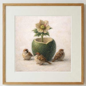 May include: A framed print featuring a still life with a green, textured vase holding a cream-colored flower. Three small brown birds are gathered around the vase, creating a serene, nature-inspired scene. The frame is made of light-colored wood.