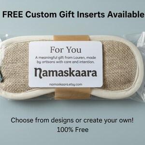 May include: A beige eye mask with a burlap texture, packaged in clear plastic. A white label reads "For You" and features the brand name "Namaskaara". The text "FREE Custom Gift Inserts Available" is also visible.