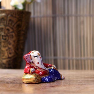 sleeping ganesha murti colorful ganpati idol spiritual home decoration