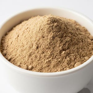 Natural ashwagandha powder heap close-up – pure herbal root powder for energy and immunity support