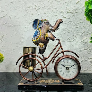 Orologio da scrivania a forma di bicicletta, decorazione con elefante, elefante a cavallo, portapenne in ferro
