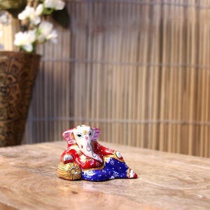 sleeping ganesha idol lying ganpati murti colorful statue home decor