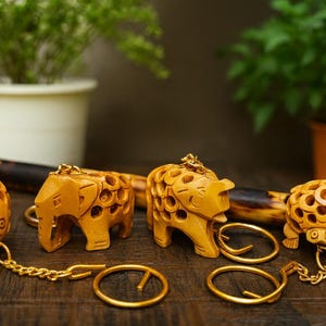 Handmade Wooden Animal Keychain Set: Jali Carved Elephants, Fish & Tortoise