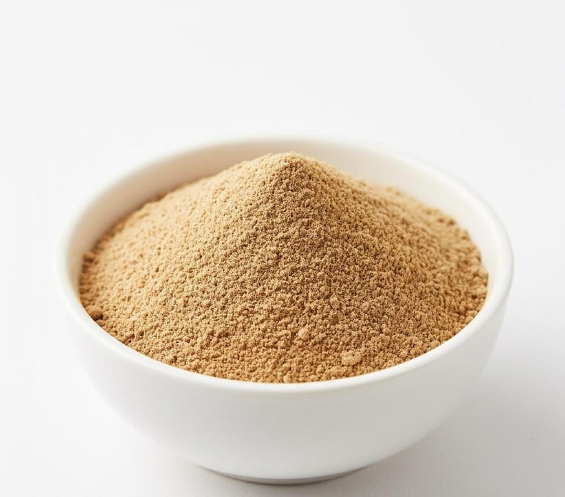 Organic ashwagandha powder close-up in bowl – natural herbal powder for stress relief and strength