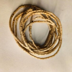 Coiled kanthi mala close-up – natural tulsi kanthi beads for spiritual practices and daily wear