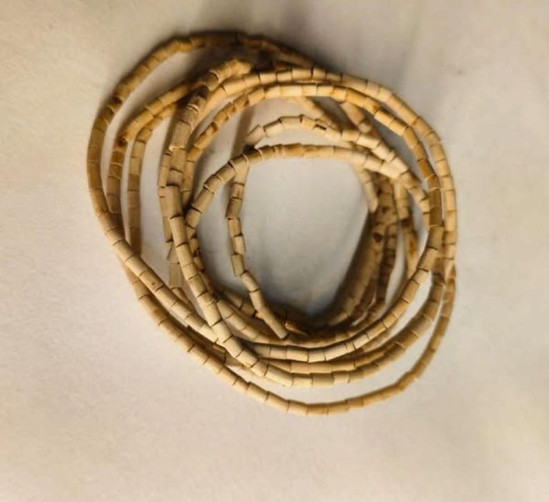 Coiled kanthi mala close-up – natural tulsi kanthi beads for spiritual practices and daily wear