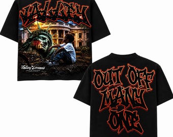 May include: A black short-sleeve t-shirt featuring a graphic print of the Statue of Liberty, the White House, and a person sitting. The front includes the text VALLEY and VALLEY DREAMS. The back features the text OUT OF MANY ONE in red and black.