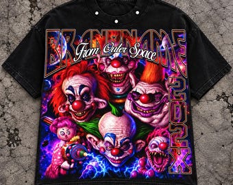 May include: A black short-sleeve t-shirt featuring a graphic print of multiple clowns and a doll with a ray gun. The text reads "BRANDNAME From Outer Space" and "202X". The shirt has a crew neckline with three visible metal studs at the collar.