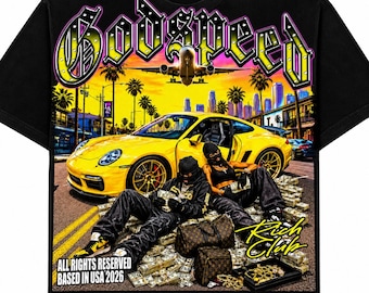 May include: A black t-shirt featuring a graphic print of a yellow sports car, two figures in black clothing, stacks of cash, and an airplane. The text reads "GODSPEED", "RICH CLUB", and "ALL RIGHTS RESERVED BASED IN USA 2026" in yellow and white.