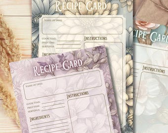 Könnte beinhalten: Rezeptkarten mit floralen Designs in Blau-, Lila- und Cremetönen. Jede Karte trägt die Aufschrift "Recipe Card" mit Feldern für den Namen des Gerichts, die Kochzeit, die Zubereitungszeit, die Portionen, die Zutaten und die Anweisungen.
