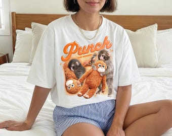 T-shirt graphique Punch The Monkey Meme Tee Top Bébé singe tenant une peluche Hommage de style rétro