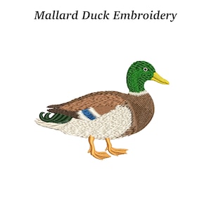 May include: Embroidered image of a mallard duck. The duck has a green head, brown body, and a yellow beak. The text "Mallard Duck Embroidery" is above the duck.