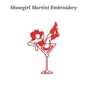 May include: Red embroidery design featuring a showgirl lounging in a martini glass. The showgirl is wearing a red outfit and boots. The text "Showgirl Martini Embroidery" is above the design.