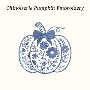 May include: A blue embroidered pumpkin design with floral and leaf details. The pumpkin has a stem and a bow at the top. The text "Chinoiserie Pumpkin Embroidery" is above the pumpkin.