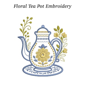 May include: Floral tea pot embroidery design. The image features a detailed embroidered teapot in blue, gold, and green. The teapot has a floral design in the center and is surrounded by floral accents. The text "Floral Tea Pot Embroidery" is at the top.