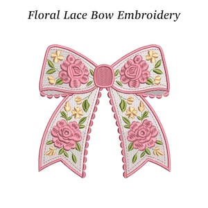 May include: Embroidered bow with pink roses, yellow flowers, and green leaves on a white background. The bow has a scalloped edge and the text "Floral Lace Bow Embroidery" at the top.