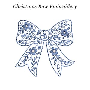 May include: An embroidered bow design with the text "Christmas Bow Embroidery". The bow is white with blue floral and leaf details. The design features a detailed outline and delicate floral accents, perfect for holiday crafts.