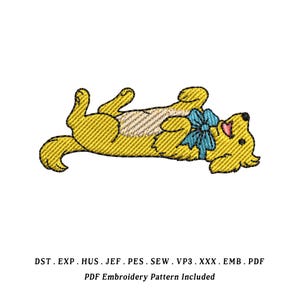 May include: An embroidered design of a yellow dog lying on its back with a blue bow. The dog has a tan belly and is smiling. The text at the bottom reads "PDF Embroidery Pattern Included".
