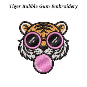 May include: Embroidered tiger face with sunglasses and a bubble gum bubble. The tiger has orange and black stripes, with pink sunglasses and a pink bubble. The text "Tiger Bubble Gum Embroidery" is above the tiger.