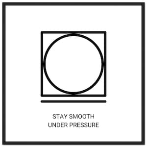 May include: A framed print with a black border features a black graphic symbol of a circle inside a square, with a horizontal line below. The text "STAY SMOOTH UNDER PRESSURE" is printed below the graphic in black.