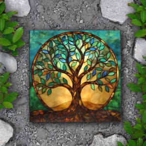 May include: A stained glass tree of life artwork with a circular design. The tree has a brown trunk and branches with green and blue leaves. The background is a gradient of blue and green.