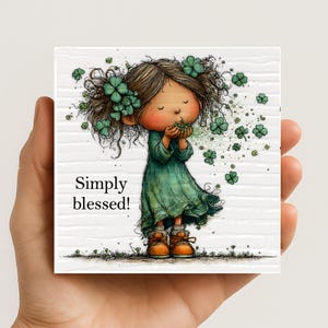 Hand holding Simply Blessed shamrock plaque showing small size Irish St Patrick’s Day decor
