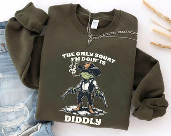 Camiseta "La única sentadilla que hago es Diddly", divertida camiseta de rana vaquera, regalo con humor del oeste, camiseta para gimnasio, western sarcástico, camiseta "Diddly Squat"