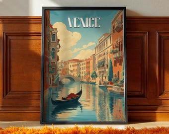 May include: A framed art print featuring a canal scene in Venice, Italy. The artwork depicts colorful buildings, a gondola, and the word "VENICE" at the top. The water reflects the buildings and sky, creating a vibrant and detailed image.