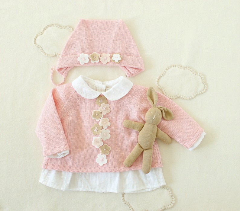 Knitted baby sweatercap baby girl in pink with felt image 0