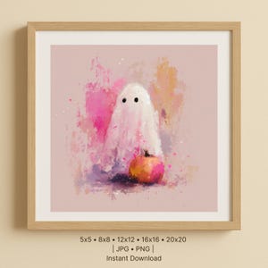 Könnte beinhalten: Gerahmter Druck mit einem Geister- und Kürbis-Motiv im Aquarellstil. Das Kunstwerk zeigt einen weißen Geist mit schwarzen Punktaugen und einen orangefarbenen Kürbis. Der Druck hat rosa, orange und violette Farbtöne. Erhältlich in verschiedenen Größen.