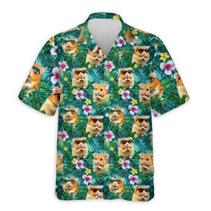 May include: Short-sleeved button-down shirt with a vibrant pattern of hamsters wearing sunglasses, set against a backdrop of tropical leaves and flowers. The shirt features a classic collar and a relaxed fit, perfect for casual wear.