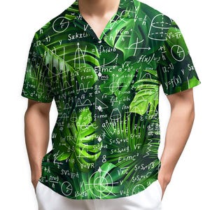 May include: Short-sleeved button-down shirt with a vibrant green tropical leaf pattern overlaid with white mathematical equations and symbols. The shirt has a classic collar and is paired with white pants.