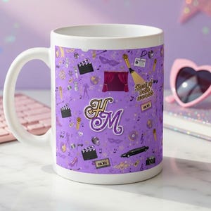 May include: White ceramic mug with a purple background and a repeating pattern of film-related icons. The mug features the initials "HM" in a decorative font, and the text "Best of both worlds".
