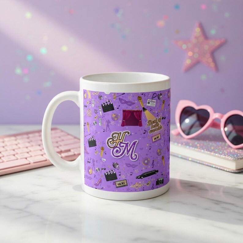 May include: White ceramic mug with a purple background and a repeating pattern of film-related icons. The mug features the initials "HM" in a decorative font, and the text "Best of both worlds".