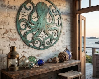 May include: A circular wall art piece featuring a teal octopus with swirling tentacles, a small anchor, and a compass star. Below, a metal lantern sits next to several glass fishing floats wrapped in rope on a wooden console table.