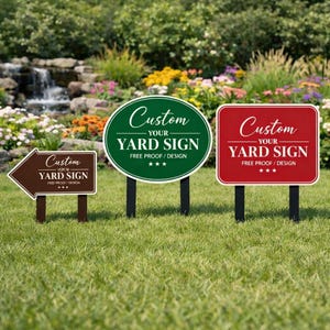 May include: Three custom yard signs in a grassy yard. The signs are brown, green, and red, each with the text "Custom Your Yard Sign" in white. The signs are in different shapes: an arrow, an oval, and a square.