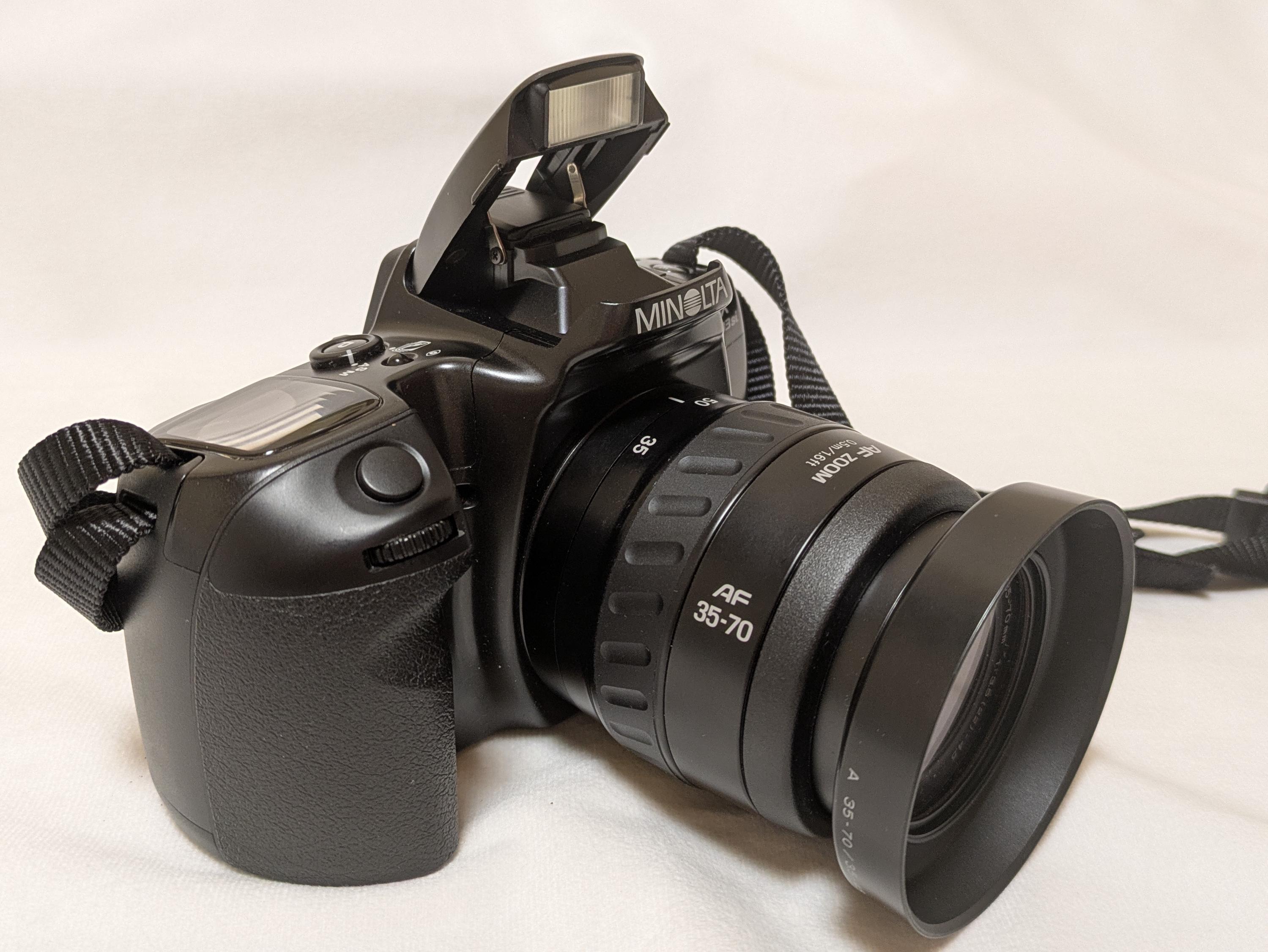 Minolta a 303si 35mm Film SLR Camera with AF Zoom Lens 35-70mm F3