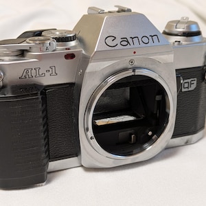 Canon AL-1 35mm filmspiegelreflexcamera, in werkende staat.
