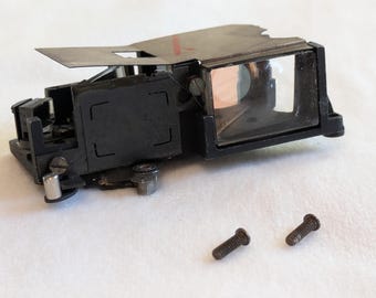 Reparatieonderdelen voor Yashica Electro 35 Finder in goede staat.