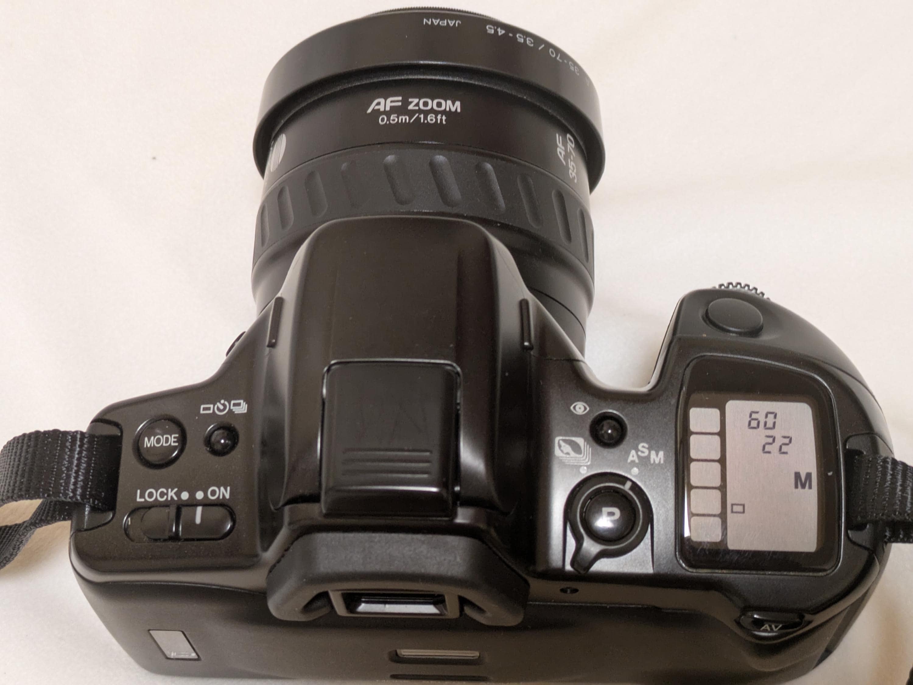 Minolta a 303si 35mm Film SLR Camera With AF Zoom Lens 35-70mm F3