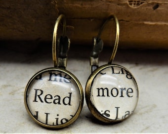 Woordoorbellen, Lees meer, boekennerd, bibliothecaris, leraar, boekenliefhebber, bibliotheek, bibliofiel