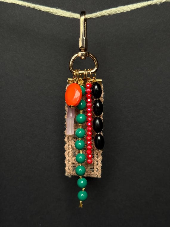 Handmade Bag Charm with Coral Bead, Green Glass & Black Accents – Playful Boho Keychain