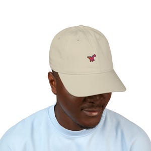 Organic Dinosaur Embroidered Baseball Cap with Playful Design
