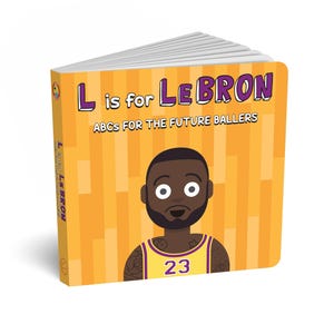 Könnte beinhalten: Ein Kinderbuch mit dem Titel "L is for LeBron" und dem Untertitel "ABCs for the Future Ballers". Das Cover zeigt eine Cartoon-Illustration eines Basketballspielers in einem gelben Trikot mit der Nummer 23.
