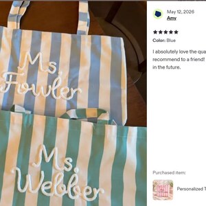 May include: Two striped tote bags, one blue and white, the other teal and white. Each bag has a name embroidered on it in white script: "Ms. Fowler" and "Ms. Webber". The bags have handles for carrying.