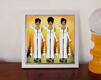 May include: A framed illustration of three women singers in white dresses and black hair, performing on a stage with yellow and white spotlights.