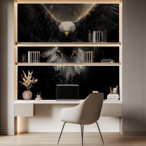 May include: A modern home office setup featuring a desk with a built-in bookshelf. The bookshelf displays an eagle mural, books, and decorative items. A laptop sits on the desk, with a white chair in front. The color scheme is neutral with warm lighting.