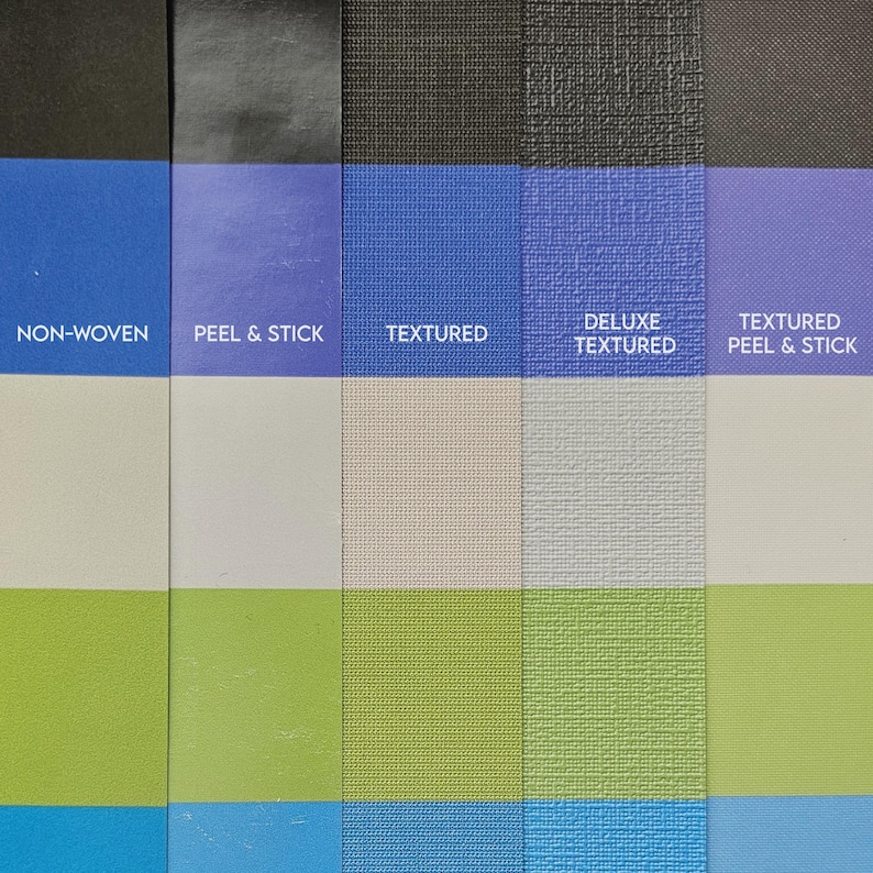 May include: A close-up of a colour palette showcasing different textures and hues. The samples include non-woven, peel & stick, and textured materials in shades of blue, white, green, and purple. Each sample is labelled with its name.