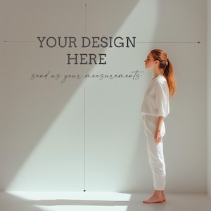 May include: A woman in a white outfit stands against a white wall with text that reads "YOUR DESIGN HERE" and "send us your measurements". The image has a minimalist aesthetic, with a shadow cast across the wall.